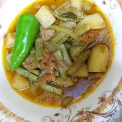 A picture of Guaar ka salan (cluster beans).