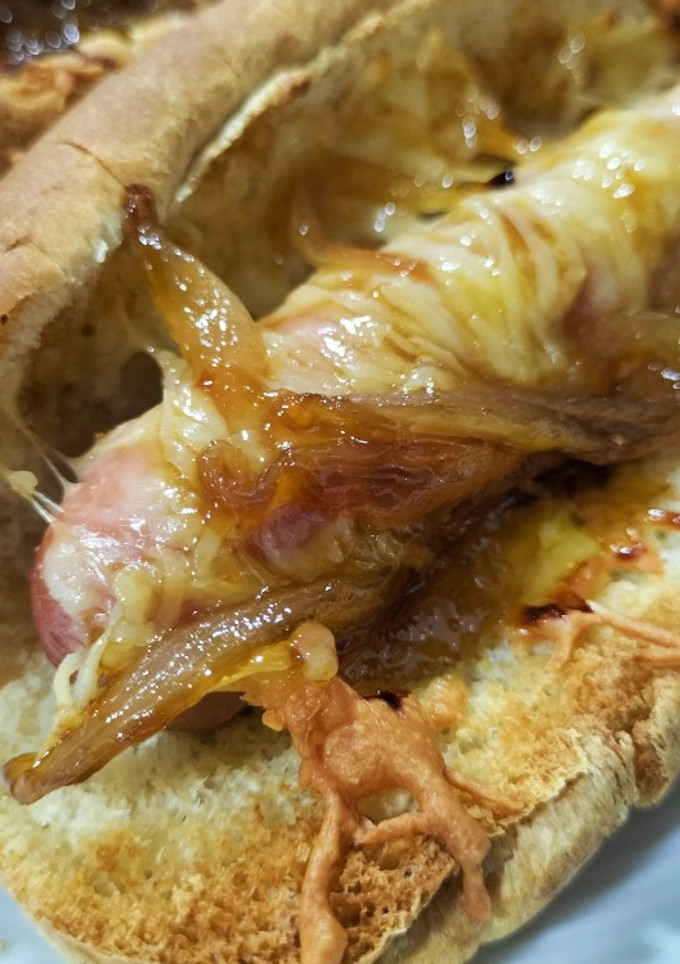 Una foto de Perritos calientes con cebolla a la naranja en airfryer