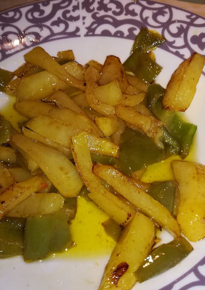 Una foto de Patatas con pimientos