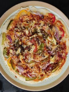 பன்னீர் பிஸ்சா (Paneer pizza recipe in tamil) செய்முறை முக்கிய புகைப்படம்