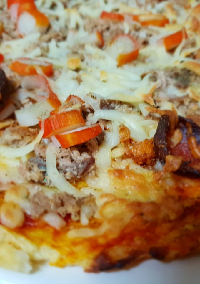 Una foto de Pizza con base de coliflor