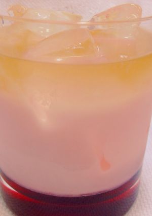 A picture of Adult Strawberry Milk with Whisky float.