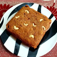 A picture of Carrot Dates Cake with Mixed Dry Fruits.