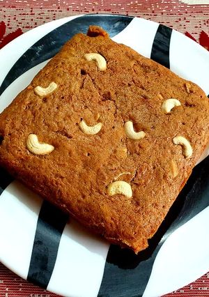 A picture of Carrot Dates Cake with Mixed Dry Fruits.