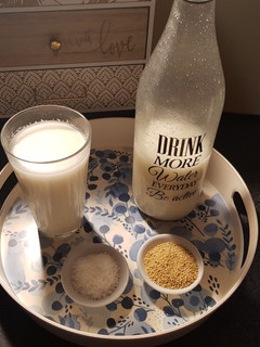 Una foto de Leche de mijo y coco