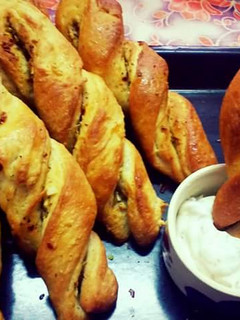 A picture of Twisted garlic bread sticks.