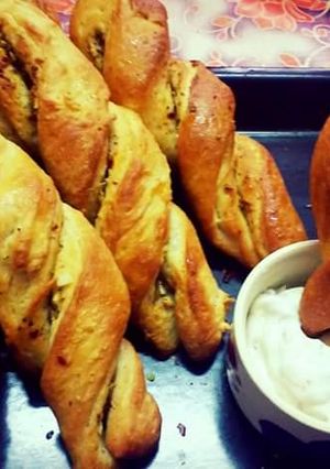 A picture of Twisted garlic bread sticks.