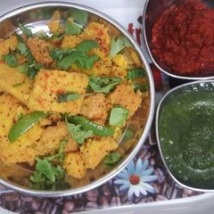 A picture of Dhokla (yellow).
