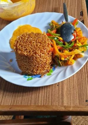 A picture of Beef pilau&stir fried Veggies #foodphotography.