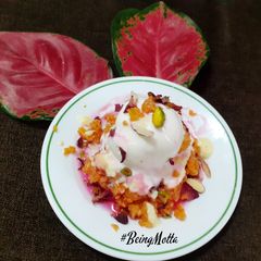 A picture of Boondi Ghevar Gulabo.