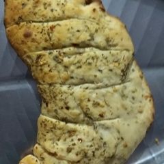 A picture of Stuff cheese garlic bread (in cooker).