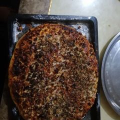 A picture of Home made smokie pizza.