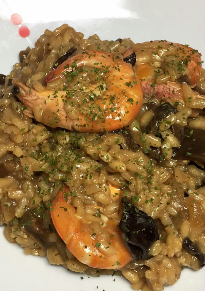 Una foto de Risotto de setas y langostinos