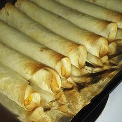 A picture of Buffalo Style Baked Taquitos.