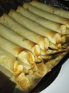 A picture of Buffalo Style Baked Taquitos.