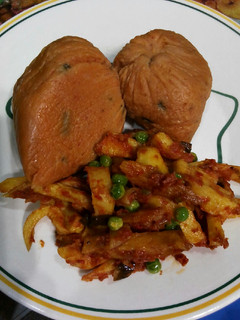 A picture of Moi moi with fried chips sauce.