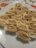Girelle di piadina con speck, certosa e paté di carciofi