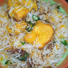 A picture of Tomato Chicken Fry Biryani.