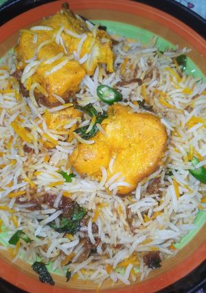 A picture of Tomato Chicken Fry Biryani.