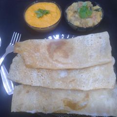A picture of Farali dosa with Farali Bhaji and Farali Tomato chutney.