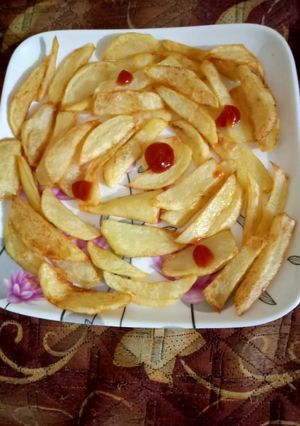 A picture of Potatoes fry.