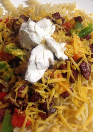 A picture of My Chorizo, peppers,cheese and philly Garlic cheese on top.😀.
