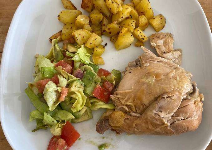 Roasted chicken with potatoes and salad