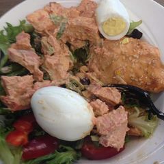 A picture of Vegetables, moi moi and boiled egg.