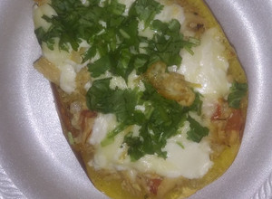 Una foto de Spaghetti squash relleno de pollo