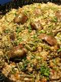 Arroz con lentejas amarillas, malvas y alcachofas