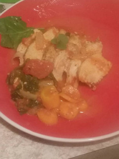 A picture of Braised Chicken in Spicy Spinach Tomato Sauce.