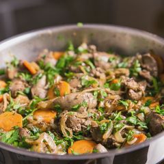 A picture of Chicken liver with onions and carrot.