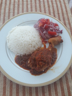 Una foto de Pollo en salsa roja