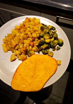 A picture of Roasted potatoes & brussel sprouts.