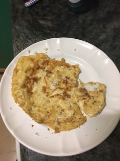 Una foto de Tortilla con pimienta y especias jugosa