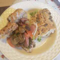 A picture of Mushroom and sausage sandwich.