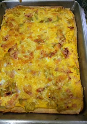 Una foto de Tarta de Zucchini Amarillo y Verde con Lomito Canadiense
