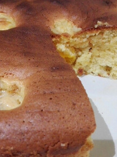 Una foto de Bizcocho con mandarinas