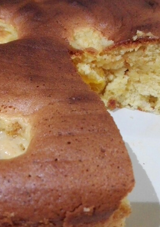Una foto de Bizcocho con mandarinas