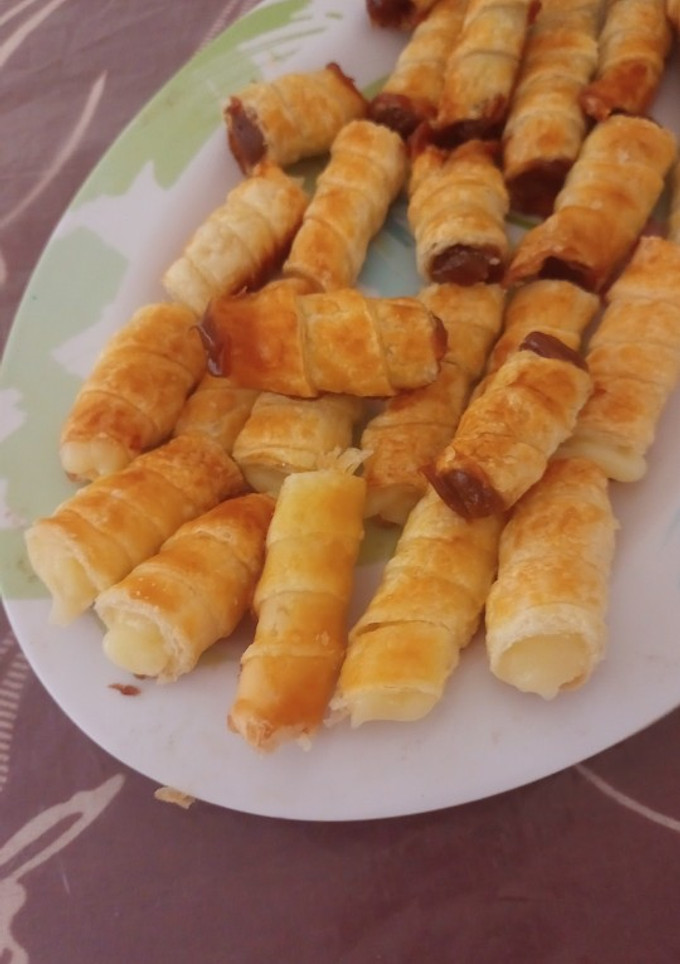 Una foto de Cañoncitos de dulce de leche y crema pastelera