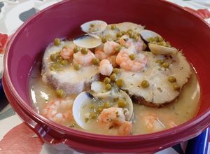 Foto principal de Medallones de merluza en salsa verde