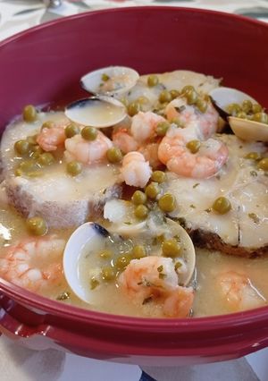 Una foto de Medallones de merluza en salsa verde