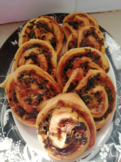 A picture of Spinach and garlic pinwheels.