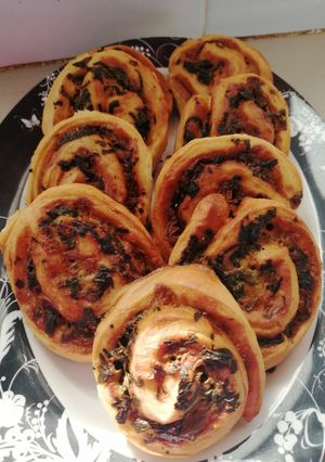A picture of Spinach and garlic pinwheels.
