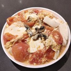 A picture of Tofu and Tomato in Sauce.