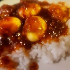 Tiger Quail Eggs on Sweet Chili Rice A picture of Tiger Quail Eggs on Sweet Chili Rice.