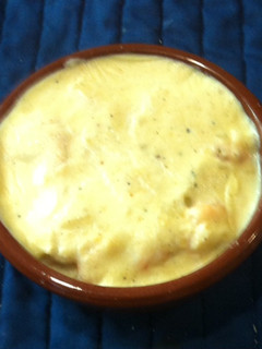Una foto de Camarones en salsa blanca con papas