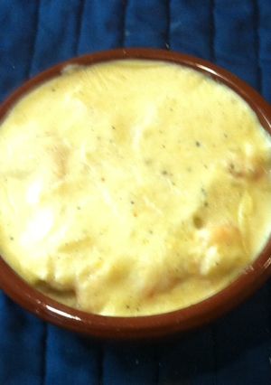 Una foto de Camarones en salsa blanca con papas