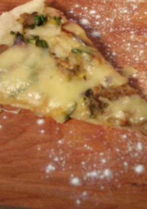 Una foto de Pizza 3 cebollas