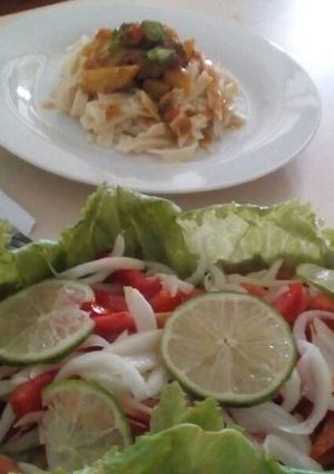 Una foto de Cinta burn con mozzarella y guisado de cochino con alcaparras